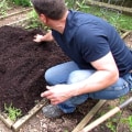 What is the first step in planting a garden?